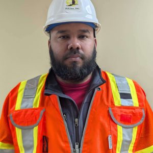 Johann in hard hat and safety vest.