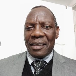 Portrait of a man in a suit.